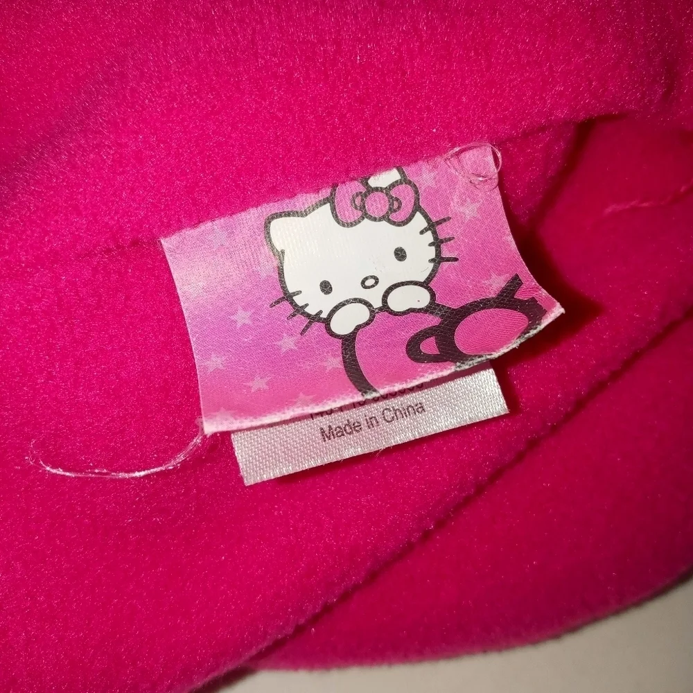 Hello Kitty girl knit beanie ear flap cap w Embroidered face and braided tassels